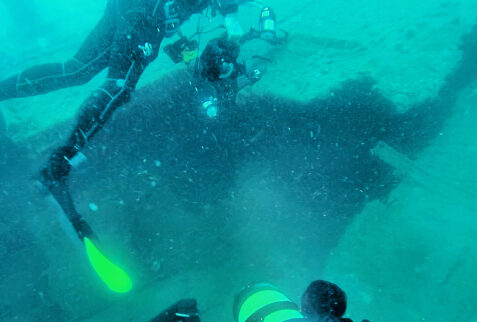 The slashed sheets where the hull split from the explosion