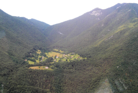 Val di Ledro – meadow embedded in Val di Ledro forests