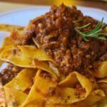 spaghetti with white ragù and pecorino cheese