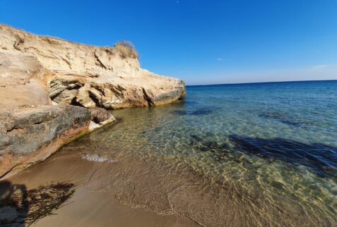 Glimpse of Cala Geniò beach - San Pietro Island