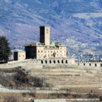Castello di Sarre Valle d'Aosta - a view of the castle. Behind it there is the village of Sarre