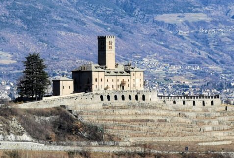 Castello di Sarre Valle d'Aosta - a view of the castle. Behind it there is the village of Sarre