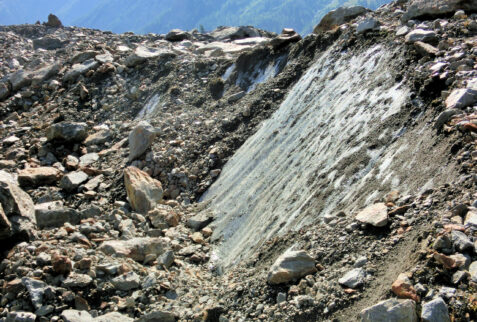 Ghiacciaio del Miage – on the black glacier some cracks unveil the underlying ice