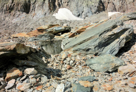 Ghiacciaio del Miage – a boulder is slowly falling into a big semi-hidden ice crack